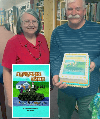 Dan Arnsan and Library Director Guna and a Trevor's Tank Story Cake!